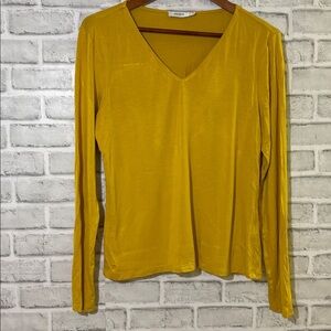 Ricki’s women’s long sleeve blouse, size medium yellow V-neck stretchy lined